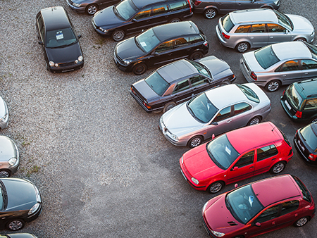 Overhead view of 17 cars in a parking lot.